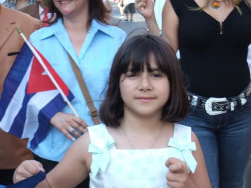 Roxana Maradiaga displays her Cuban Pride carrying the Cuban flag from 79
