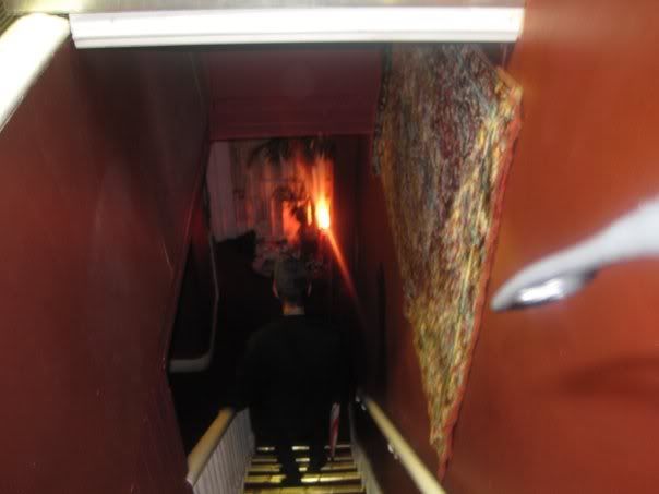 Going down the stairs to our room