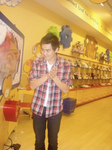 putting a heart into his bear